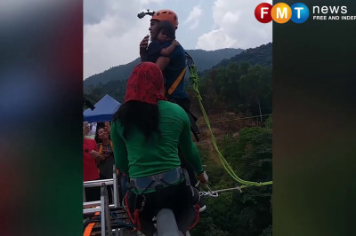 Мужчина с 2-летней дочерью прыгнул с тарзанки .