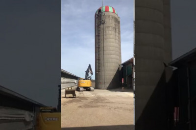 Экскаватор и башня  